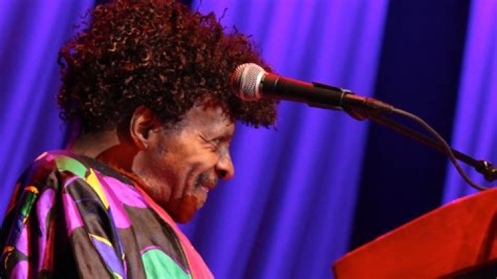 Sly Stone: dating, net worth, tattoos, smoking & body facts